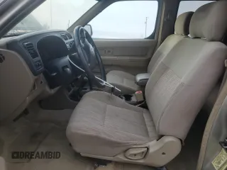 2000 Nissan Frontier XE with VIN 1N6ED27Y3YC366060, listed as a Copart auction lot 48955585 with 158,565 mi miles and Salvage title. Bid and sale history available at DreamBid. Image 7.