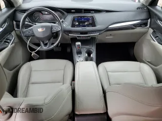 2019 Cadillac XT4 AWD Luxury with VIN 1GYFZBR43KF130284, listed as a Copart auction lot 67639354 with 79,245 mi miles and Non Repairable. Bid and sale history available at carsss.com. Image 8.