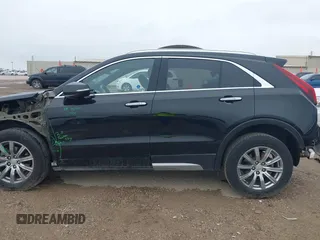 2023 Cadillac XT4 FWD Premium Luxury with VIN 1GYFZCR48PF142752, listed as a IAAI auction lot 42183025 with 45,536 mi miles and . Bid and sale history available at DreamBid. Image 15.