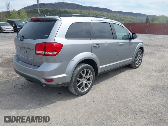 2017 Dodge Journey GT with VIN 3C4PDDEG2HT600422, listed as a IAAI auction lot 42092363 with 96,502 mi miles and . Bid and sale history available at DreamBid. Image 4.