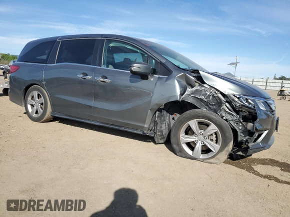 2018 Honda Odyssey EX-L with VIN 5FNRL6H76JB010103, listed as a Copart auction lot 52965965 with 129,837 mi miles and Salvage Title. Bid and sale history available at carsss.com. Image 4.