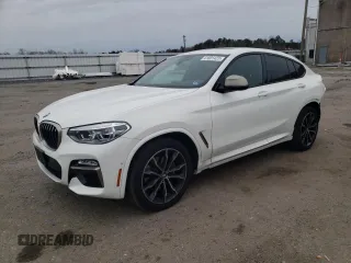 2019 BMW X4 M40i with VIN 5UXUJ5C5XK9A32960, listed as a Copart auction lot 41801423 with 24,326 mi miles. Bid and sale history available at carsss.com. Image 1.