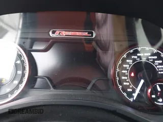 2019 Ram 1500 Rebel z VIN 1C6SRFLT6KN599362, wystawiony jako IAAI lot #41560018 z przebiegiem Nie podano mil oraz . Historia ofert i sprzedaży dostępna na DreamBid. Obrazek 15.
