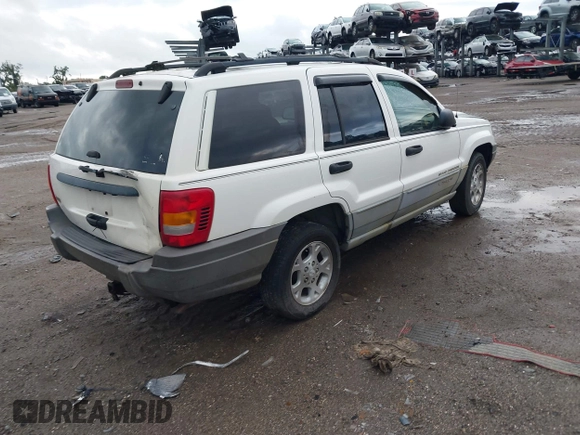 2000 Jeep Grand Cherokee Laredo z VIN 1J4G248S2YC339997, wystawiony jako IAAI lot #42395079 z przebiegiem 261 704 mil mil oraz . Historia ofert i sprzedaży dostępna na DreamBid. Obrazek 4.