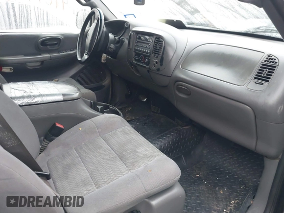 2002 Ford F-150 XL with VIN 1FTRX17W92NA80214, listed as a IAAI auction lot 41074951 with 164,048 mi miles. Bid and sale history available at carsss.com. Image 5.