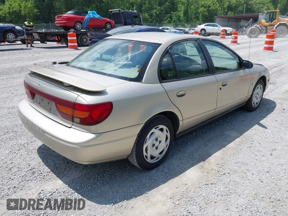2001 Saturn SL z VIN 1G8ZK54721Z272773, wystawiony jako IAAI lot #42449133 z przebiegiem 56 714 mil mil oraz . Historia ofert i sprzedaży dostępna na DreamBid. Obrazek 4.