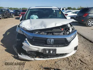 2021 Honda Odyssey Touring with VIN 5FNRL6H86MB003309, listed as a Copart auction lot 51648654 with 132,393 mi miles and Salvage Title. Bid and sale history available at carsss.com. Image 5.