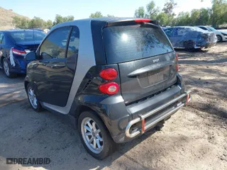 2008 Smart fortwo Pure with VIN WMEEJ31X28K187372, listed as a IAAI auction lot 41993316 with 113,248 mi miles. Bid and sale history available at carsss.com. Image 3.