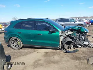 2022 Porsche Cayenne E-Hybrid Hybrid z VIN WP1AE2AY7NDA26826, wystawiony jako IAAI lot #41669548 z przebiegiem 22 644 mil mil oraz . Historia ofert i sprzedaży dostępna na DreamBid. Obrazek 13.