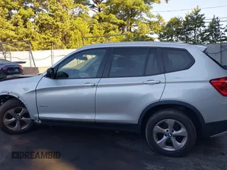 2011 BMW X3 28i with VIN 5UXWX5C5XBL706239, listed as a IAAI auction lot 40258614 with 143,079 mi miles. Bid and sale history available at carsss.com. Image 14.