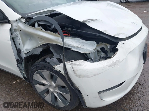 2021 Tesla Model Y Standard Range with VIN 5YJYGDED3MF103499, listed as a IAAI auction lot 41632064 with 132,846 mi miles and . Bid and sale history available at DreamBid. Image 6.
