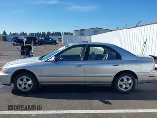 1997 Honda Accord Special Edition with VIN 1HGCD5603VA115569, listed as a IAAI auction lot 41636725 with 216,937 mi miles and . Bid and sale history available at carsss.com. Image 14.