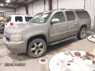 2007 Chevrolet Suburban LTZ with VIN 1GNFK16397J255558, listed as a IAAI auction lot 41804073 with 176,503 mi miles and . Bid and sale history available at DreamBid. Image 2.