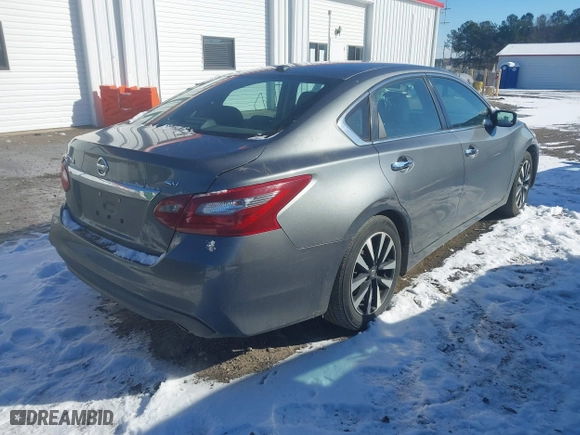 2018 Nissan Altima 2.5 SV with VIN 1N4AL3AP3JC101063, listed as a IAAI auction lot 41381019 with 198,695 mi miles. Bid and sale history available at carsss.com. Image 4.