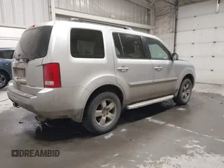 2011 Honda Pilot EX-L with VIN 5FNYF4H66BB029802, listed as a IAAI auction lot 42101545 with 240,127 mi miles and . Bid and sale history available at carsss.com. Image 4.