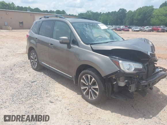 2017 Subaru Forester Touring with VIN JF2SJGWCXHH558789, listed as a IAAI auction lot 42518698 with 112,294 mi miles and . Bid and sale history available at DreamBid. Image 1.