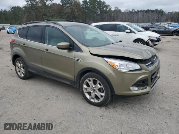 2013 Ford Escape SE with VIN 1FMCU0GX2DUB80872, listed as a Copart auction lot 85800144 with 98,304 mi miles and Salvage Title. Bid and sale history available at DreamBid. Image 4.