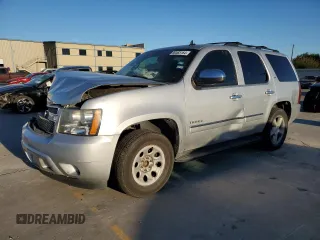 2012 Chevrolet Tahoe LTZ z VIN 1GNSCCE04CR244011, wystawiony jako Copart lot #80465164 z przebiegiem Nie podano mil oraz Szkoda całkowita • Salvage title. Historia ofert i sprzedaży dostępna na DreamBid. Obrazek 1.