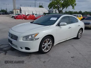 2014 Nissan Maxima SV z VIN 1N4AA5AP0EC473211, wystawiony jako IAAI lot #41863206 z przebiegiem 79 184 mil mil oraz . Historia ofert i sprzedaży dostępna na DreamBid. Obrazek 2.