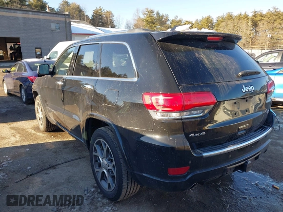 2021 Jeep Grand Cherokee Overland with VIN 1C4RJFCG3MC601150, listed as a IAAI auction lot 41421403 with 165,614 mi miles and . Bid and sale history available at DreamBid. Image 3.