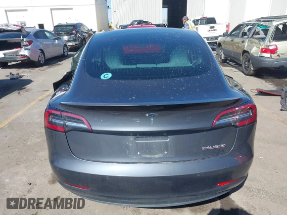 2018 Tesla Model 3 Long Range Battery with VIN 5YJ3E1EBXJF055203, listed as a IAAI auction lot 42019770 with 57,379 mi miles and . Bid and sale history available at DreamBid. Image 16.