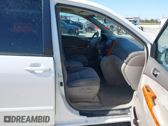 2006 Toyota Sienna XLE with VIN 5TDZA22C06S576958, listed as a IAAI auction lot 41978892 with 257,598 mi miles. Bid and sale history available at carsss.com. Image 5.