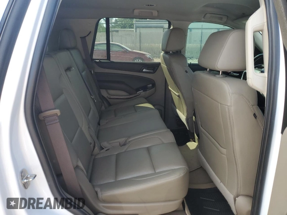 2019 Chevrolet Tahoe LT z VIN 1GNSCBKCXKR379274, wystawiony jako Copart lot #57878805 z przebiegiem 77 936 mil mil oraz Czysty tytuł • Clean title. Historia ofert i sprzedaży dostępna na DreamBid. Obrazek 11.