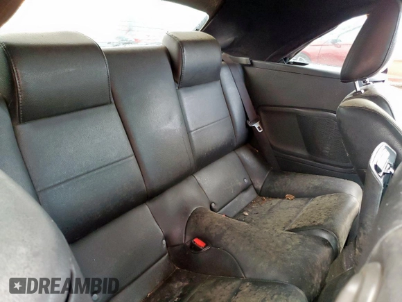 2005 Ford Mustang Deluxe z VIN 1ZVFT84N855220533, wystawiony jako Copart lot #58666635 z przebiegiem 169 200 mil mil oraz Czysty tytuł • Clean title. Historia ofert i sprzedaży dostępna na DreamBid. Obrazek 10.