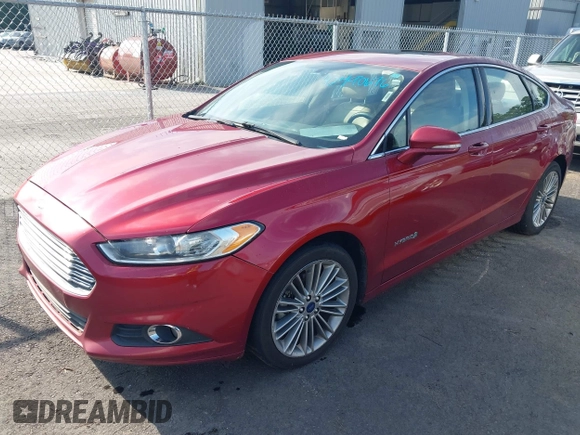 2014 Ford Fusion SE Hybrid with VIN 3FA6P0LU4ER125844, listed as a IAAI auction lot 42490676 with 246,821 mi miles and . Bid and sale history available at DreamBid. Image 2.