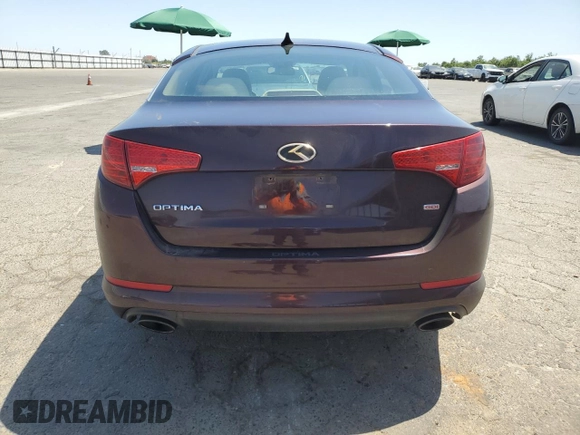 2013 Kia Optima LX z VIN 5XXGM4A70DG230213, wystawiony jako Copart lot #58193905 z przebiegiem 116 106 mil mil oraz Szkoda całkowita • Salvage title. Historia ofert i sprzedaży dostępna na DreamBid. Obrazek 6.