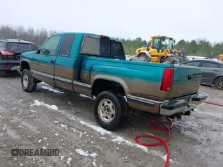 1994 GMC Sierra 1500 with VIN 2GDEK19K2R1549660, listed as a IAAI auction lot 41615642 with 207,399 mi miles and . Bid and sale history available at DreamBid. Image 3.