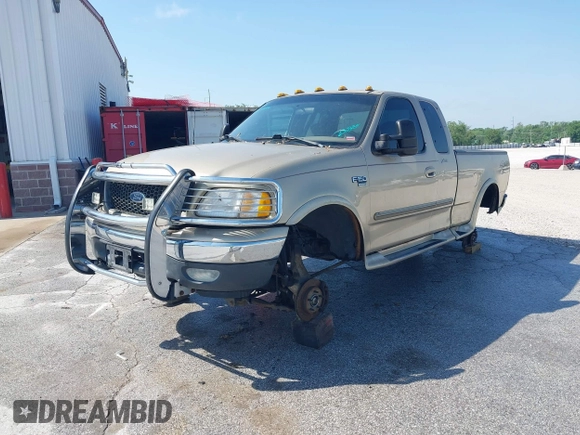 2000 Ford F-150 XL with VIN 1FTRX18L7YNA42980, listed as a IAAI auction lot 42273446 with 208,563 mi miles and . Bid and sale history available at DreamBid. Image 2.
