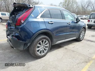 2021 Cadillac XT4 AWD Premium Luxury z VIN 1GYFZDR45MF048569, wystawiony jako IAAI lot #41902941 z przebiegiem 53 891 mil mil oraz . Historia ofert i sprzedaży dostępna na DreamBid. Obrazek 4.