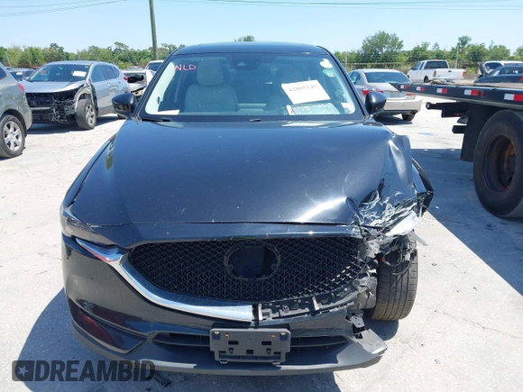 2017 Mazda CX-5 Grand Touring with VIN JM3KFBDL6H0200830, listed as a IAAI auction lot 42005145 with 90,510 mi miles. Bid and sale history available at carsss.com. Image 12.
