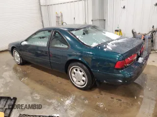 1995 Ford Thunderbird LX with VIN 1FALP62W8SH205542, listed as a Copart auction lot 47741815 with 128,401 mi miles and Clean Title. Bid and sale history available at DreamBid. Image 2.
