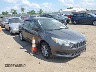 2016 Ford Focus SE with VIN 1FADP3F23GL392347, listed as a IAAI auction lot 39951722 with 143,679 mi miles. Bid and sale history available at carsss.com. Image 1.