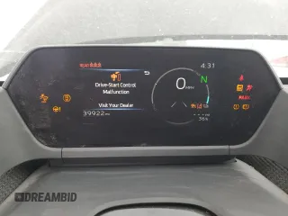 2023 Toyota bZ4X XLE z VIN JTMABACA1PA009058, wystawiony jako Copart lot #42633585 z przebiegiem 39 922 mil mil oraz Szkody całkowita. Historia ofert i sprzedaży dostępna na DreamBid. Obrazek 9.