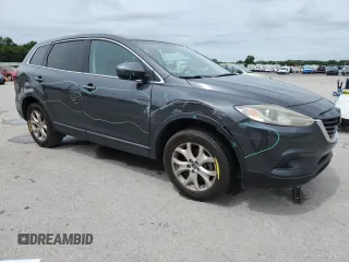 2015 Mazda CX-9 Touring with VIN JM3TB2CA1F0451039, listed as a Copart auction lot 61267635 with 173,967 mi miles and Clean title. Bid and sale history available at DreamBid. Image 4.