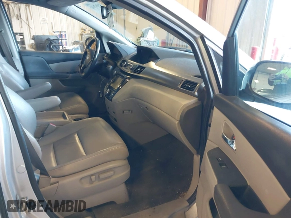 2015 Honda Odyssey EX-L with VIN 5FNRL5H6XFB063430, listed as a IAAI auction lot 41913142 with 238,051 mi miles and . Bid and sale history available at carsss.com. Image 5.