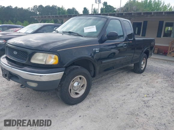 2000 Ford F-150 XL with VIN 1FTRX18LXYNB58643, listed as a IAAI auction lot 42100553 with 382,492 mi miles. Bid and sale history available at carsss.com. Image 2.