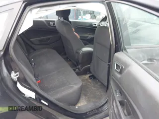 2015 Ford Fiesta SE with VIN 3FADP4BJ5FM130099, listed as a IAAI auction lot 42126960 with 82,299 mi miles and . Bid and sale history available at DreamBid. Image 8.