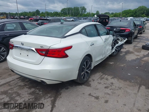 2018 Nissan Maxima SL with VIN 1N4AA6AP2JC395188, listed as a IAAI auction lot 42540832 with 106,898 mi miles and . Bid and sale history available at DreamBid. Image 4.