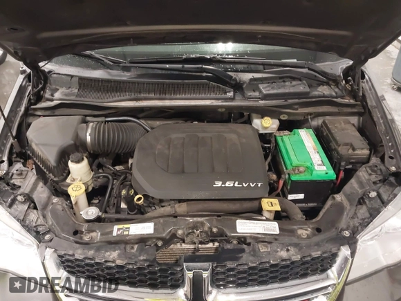 2015 Dodge Grand Caravan SE with VIN 2C4RDGBG2FR643477, listed as a IAAI auction lot 41955909 with 451,432 mi miles and . Bid and sale history available at DreamBid. Image 10.