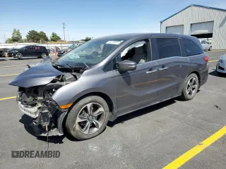 2020 Honda Odyssey Touring with VIN 5FNRL6H84LB032418, listed as a Copart auction lot 59118565 with Not provided miles and Salvage title. Bid and sale history available at DreamBid. Image 1.