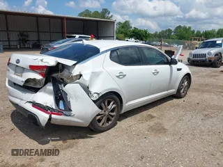 2013 Kia Optima LX z VIN 5XXGM4A79DG170660, wystawiony jako IAAI lot #42216942 z przebiegiem 210 481 mil mil oraz . Historia ofert i sprzedaży dostępna na DreamBid. Obrazek 4.