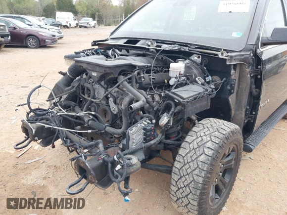 2017 Chevrolet Tahoe LT with VIN 1GNSKBKCXHR388181, listed as a IAAI auction lot 41936609 with 94,783 mi miles and . Bid and sale history available at DreamBid. Image 6.