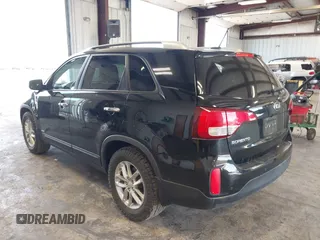 2014 Kia Sorento LX with VIN 5XYKTCA64EG541574, listed as a IAAI auction lot 42067910 with 144,234 mi miles and . Bid and sale history available at carsss.com. Image 3.
