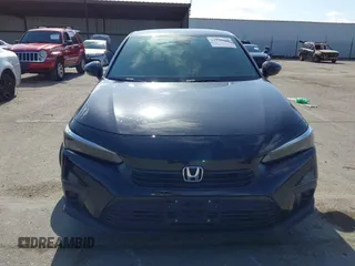 2023 Honda Civic Sport with VIN 2HGFE2F55PH505548, listed as a IAAI auction lot 42128060 with 46,350 mi miles and . Bid and sale history available at DreamBid. Image 12.