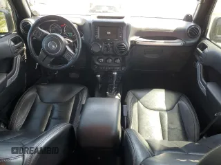 2014 Jeep Wrangler Unlimited Sahara z VIN 1C4BJWEG4EL164226, wystawiony jako Copart lot #53849355 z przebiegiem 82 145 mil mil oraz Szkoda całkowita • Salvage title. Historia ofert i sprzedaży dostępna na DreamBid. Obrazek 8.