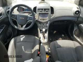 2014 Chevrolet Sonic LT with VIN 1G1JC5SH8E4242409, listed as a Copart auction lot 55356865 with 141,497 mi miles and Clean Title. Bid and sale history available at DreamBid. Image 12.